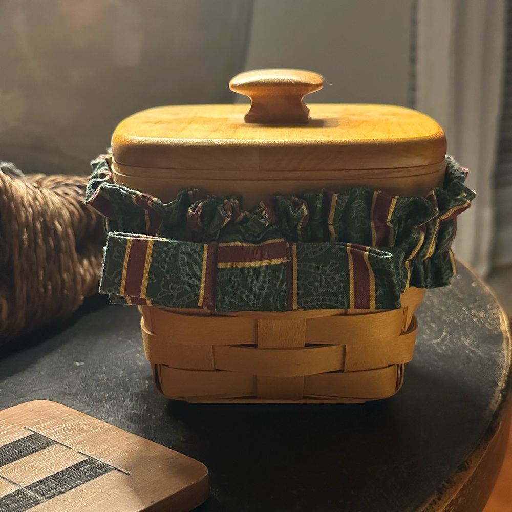 Authentic Longaberger Wooden Basket with decorative fabric liner.